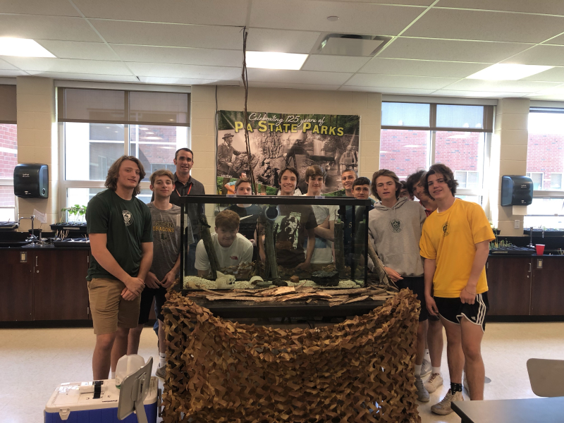 Lewisburg High School students with their eel tank.